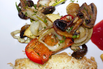 Grilled Vegetables and Mushrooms Served on a White Plate in a Home Kitchen During a Summer Afternoon