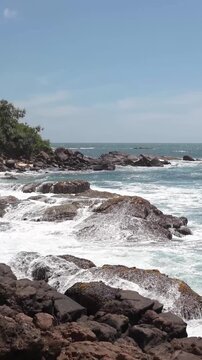 Large waves hitting the rocks in the Indian Ocean in Sri Lanka