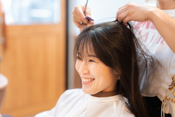 Fototapeta premium 前髪ヘアカットイメージ