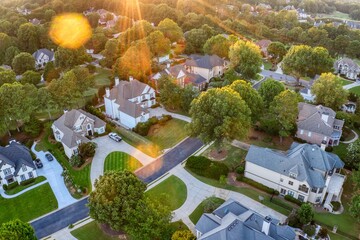 Aerial view of an upscale subdivision in suburbs of USA shot in HDR during Golden hour