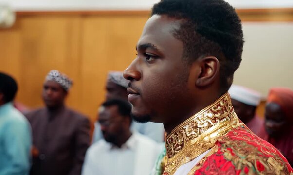 Nigerian Man Engaged in Community Meeting