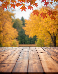 The empty wooden table top with blur background of autumn Maple leaves. Exuberant image