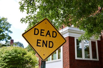 dead end sign on the street