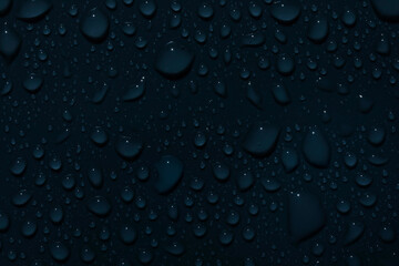 Close-up of fresh water drops by night