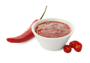 Hot chili sauce in bowl and pepper isolated on white