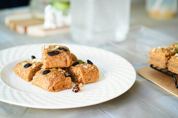 A bar of oat flakes, with bananas, nuts, dried fruits and honey. Healthy food.