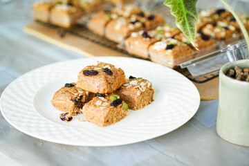 A bar of oat flakes, with bananas, nuts, dried fruits and honey. Healthy food.