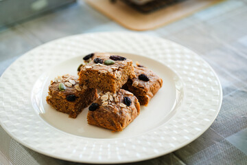 A bar of oat flakes, with bananas, nuts, dried fruits and honey. Healthy food.