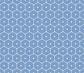 Pattern of geometric shapes. Blue color on matching background. Bold stacked rounded hexagons mosaic cells. Hexagonal shapes. Seamless pattern. Tileable vector illustration.