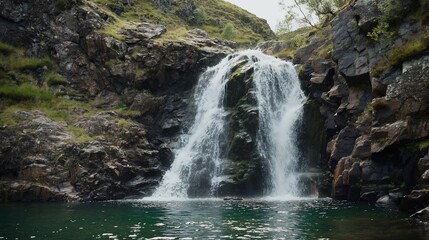 Fototapeta premium beautiful waterfall cascading down a rocky cliff