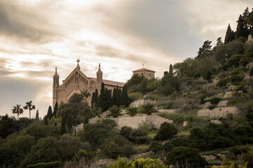 Obraz premium a church on a hill in Mallorca, Spain