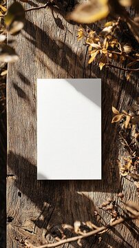 6x9 size white greeting card mockup, top view, weathered wooden table, scenic light