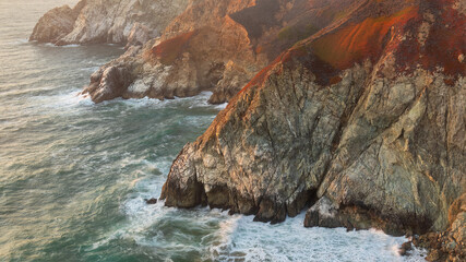 The sheer cliffs of Devil's Slide promontory, San Mateo County Coast between Montara and Pacifica...