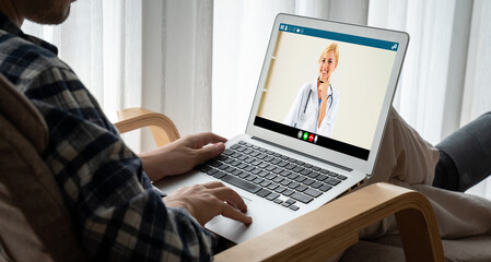 Doctor video call online by modish telemedicine software application for virtual meeting with patient