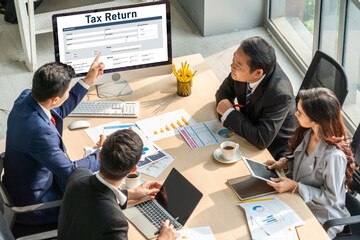 Online tax return form for submitting individual income tax return form snugly on the internet website. Government web for tax payment and return. Taxation technology concept.
