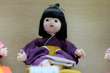 doll with a toy