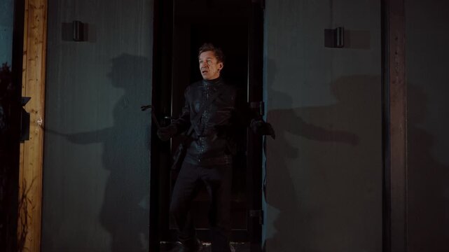 The thief is caught by the police with flashing lights.