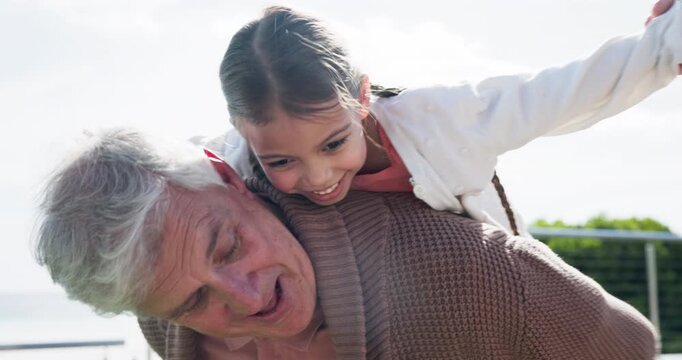Grandparents, airplane and kid holding hands outdoor, bonding and freedom together. Senior woman, man piggyback child and happy girl play flying game with grandmother, grandfather or portrait of love