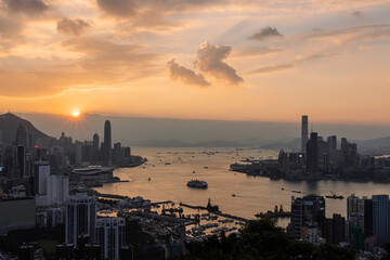 Fototapeta premium Yellow sunset over Victoria harbour. Hong Kong.