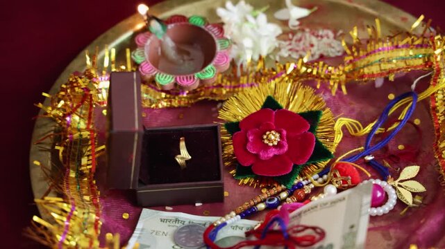 isolated holy plate decorated with religious thread rakhi at hindu raksha bandhan festival at indoor