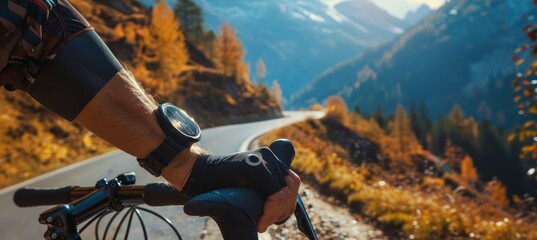Disabled Cyclist Adjusting Prosthetic Arm on Bike Handlebar with Scenic Mountain Road
