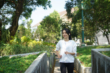 young woman running in the park