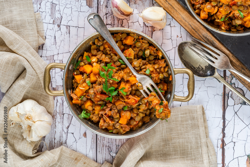 Canvas Prints Brown lentils stew with white wine, serrano ham and smoked paprika