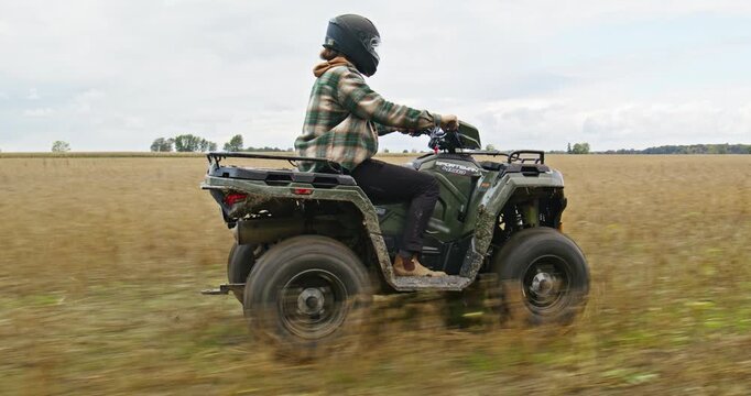 ATV Adventuring Across Field
