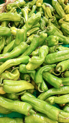 A pile of sweet bell peppers on the counter