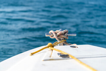 sailors knot in front of the yacht boat. luxury and private concept. boat on the sea, summer cruise...