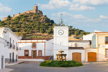 Clock Tower and Miraflores Castle in Alconchel, Badajoz, Extremadura, Spain