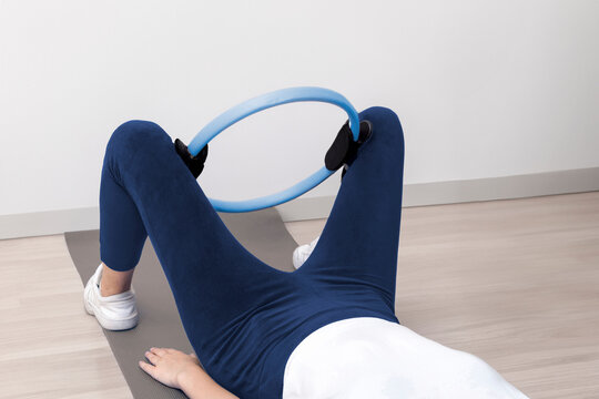 woman doing various sports moves - exercises for healthy life, pelvic floor exercise. Home sport workout. Elbows static balance stand. Floor stretching. Healthy lifestyle.