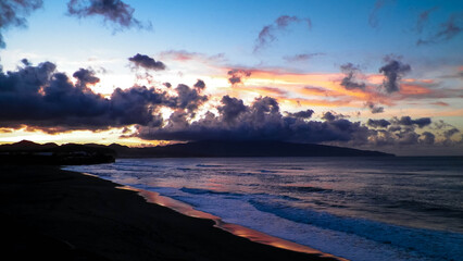 Beautiful sunset over beach in Ribiera Grande, Atlantic Ocean, Azores Islands.