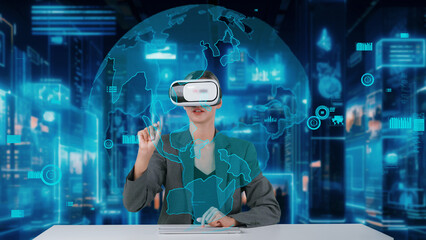Businesswoman pointing world market data rotating analysis screen by VR future global innovation interface digital infographic network technology virtual hologram global animation server. Contraption.