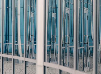 abstract background reflected in the glass windows of the building