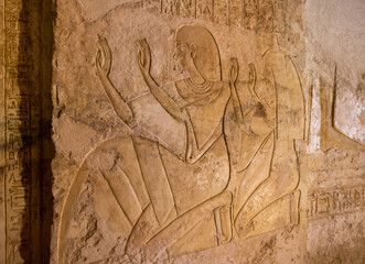Fototapeta premium Relief showing (Amenemopet) the Chief Steward of Amon in his tomb Valley of Nobles in Thebes - Luxor. Egypt.