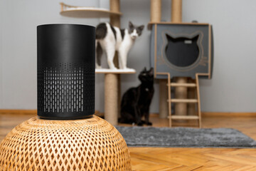 air purifier in the area with pets or cat. Air Pollution Concept. Air purifier, filters out...