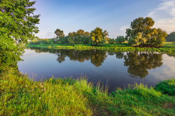 A calm river with trees on both sides