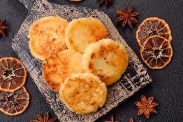 Delicious fresh sweet cheese pancakes with raisins and cinnamon