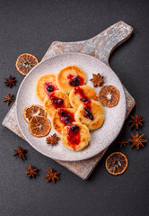 Delicious fresh sweet cheese pancakes with raisins and cinnamon