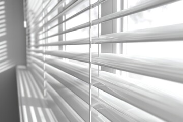 Obraz premium Miniblinds partially drawn back to let in daylight, creating a soft, diffused light in the room.
