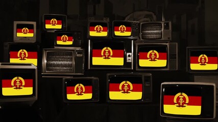  Flag of East Germany Displayed on Old Stacked TVs