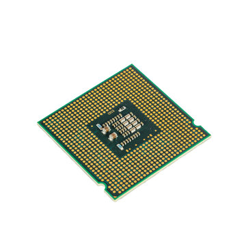 Isolated shot of the underside of a computer CPU chip.