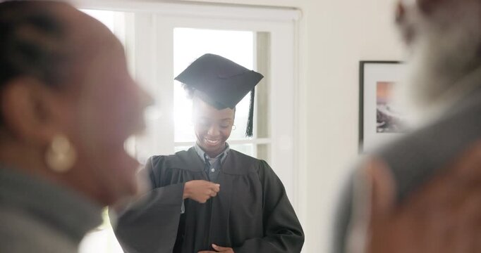 Graduation, family and happy or proud in home for achievement, success and education in living room. Graduate, black girl and parents with pride for diploma, study or learning in lounge of house