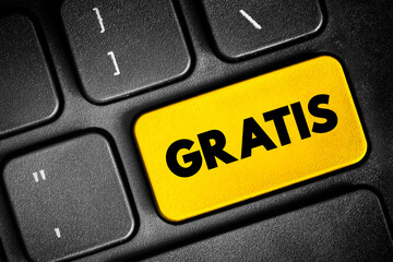 Gratis - without charge or payment, text concept button on keyboard