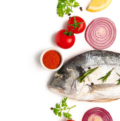 Raw dorado fish with ingredients on white background