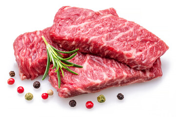 Raw pieces of beef with peppercorn and rosemary isolated on white background. Closeup.