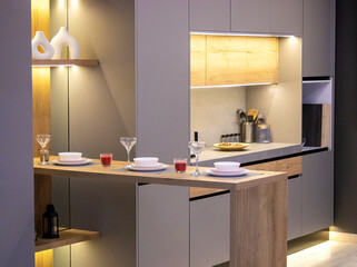 A beautiful kitchen detail with cabinets, modern kitchen countertop  
