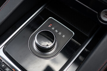 Close-Up of Automatic Car Gear Shifter: Sleek and Modern Design in Contemporary Vehicle Interior