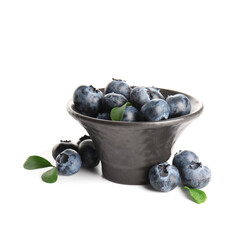 Bowl of ripe blueberry on white background, closeup